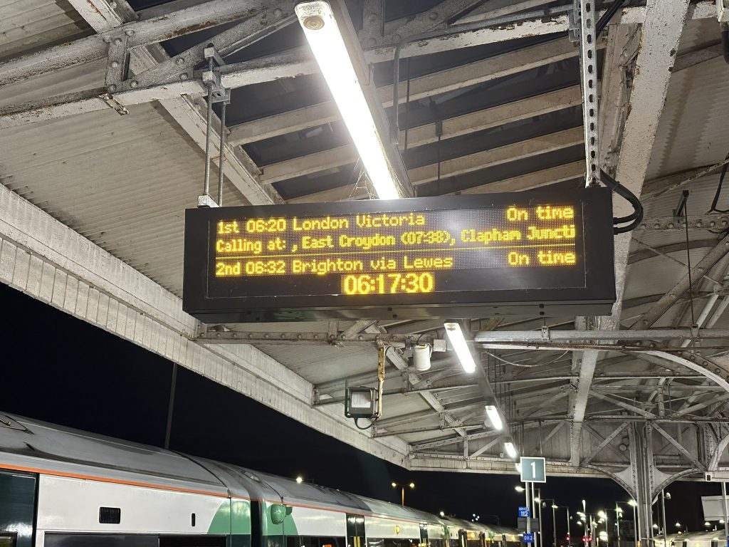 Train station board showing the time of the next departing train